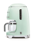 Side view of pastel green Smeg coffee machine on a white background