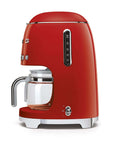Side view of red Smeg coffee machine on a white background