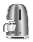 Side view of stainless steel Smeg coffee machine on a white background