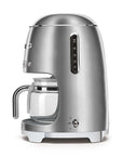 Side view of stainless steel Smeg coffee machine on a white background