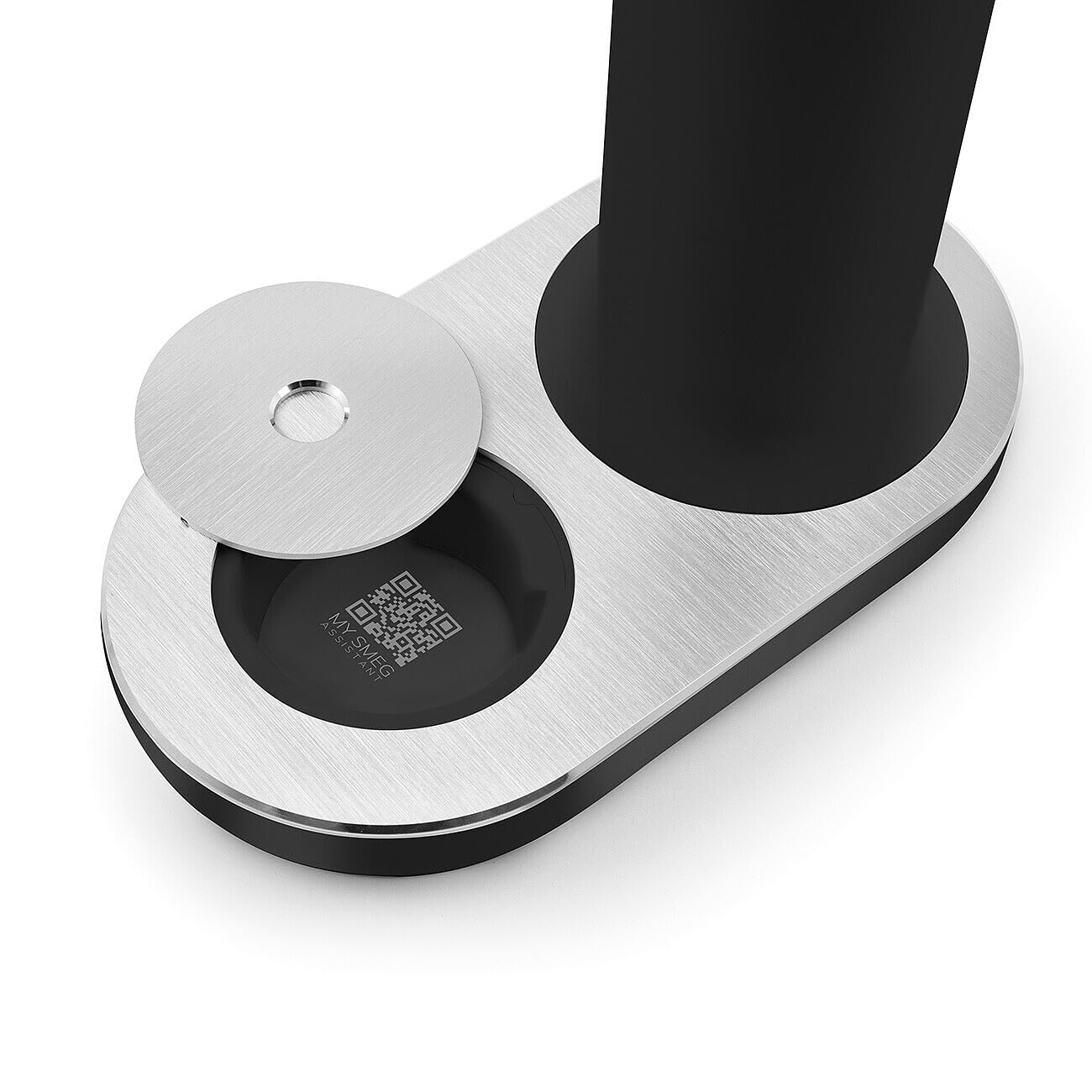 Metallic stand with circular base and black cylindrical component on a white background