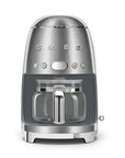 Front view of stainless steel Smeg coffee machine on a white background