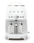 White Smeg retro line drip coffee machine on a white background