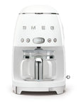 White Smeg retro line drip coffee machine on a white background