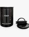 Black Moccamaster coffee storage canister with lid on a white background