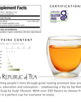 Tea packaging with supplement facts, caffeine content, and a glass of tea.