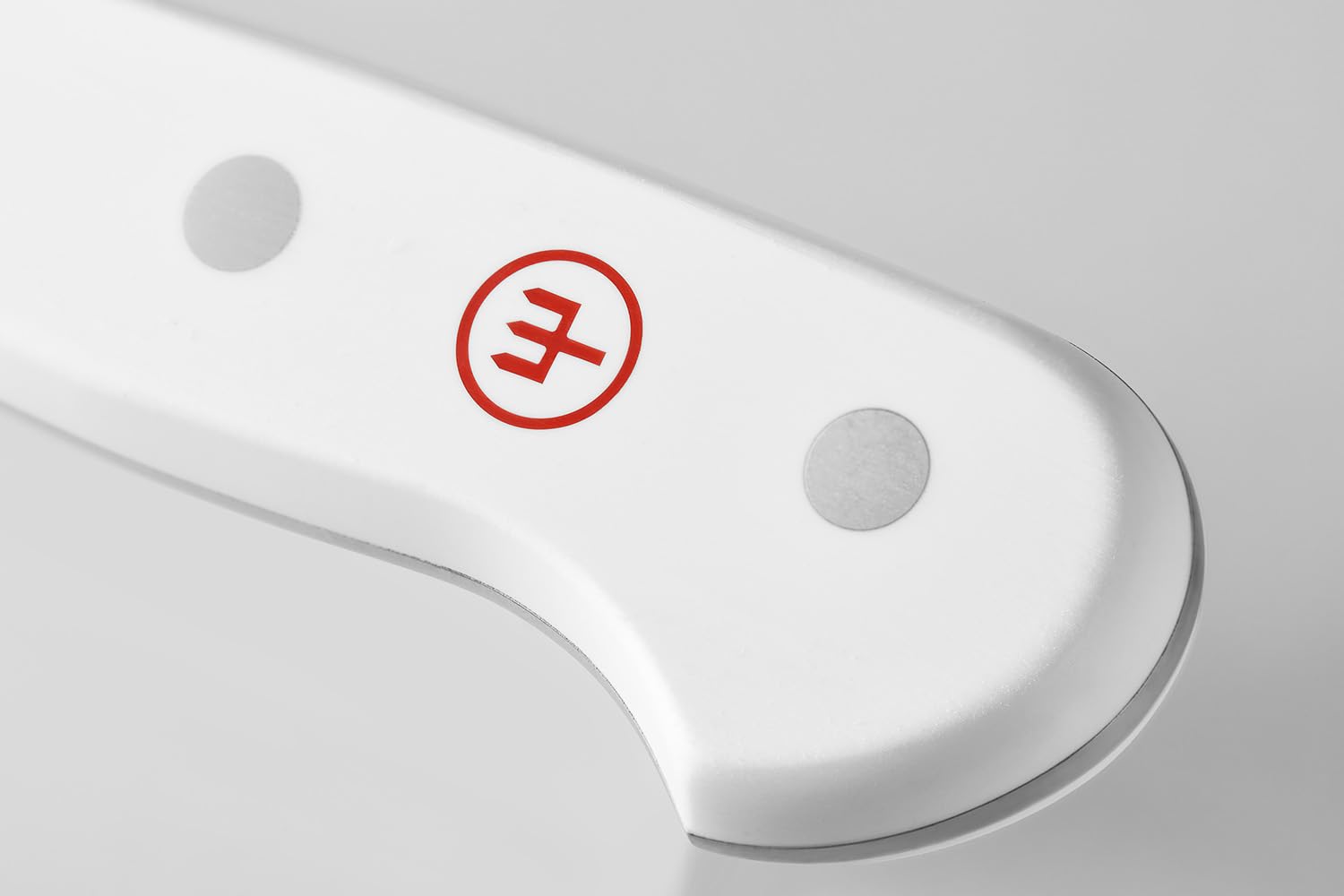 White electronic device with a red logo on a light gray background