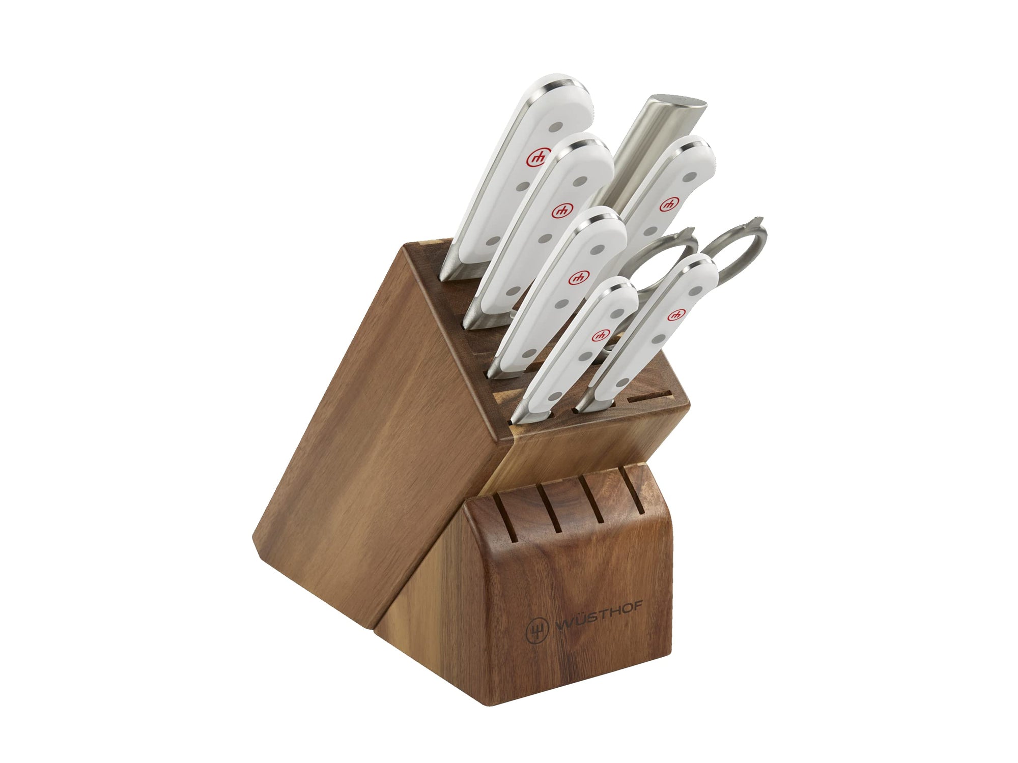 Set of knives in a wooden block on a white background