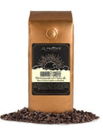 1 lb decaf coffee bag with coffee beans in front displayed on a white background