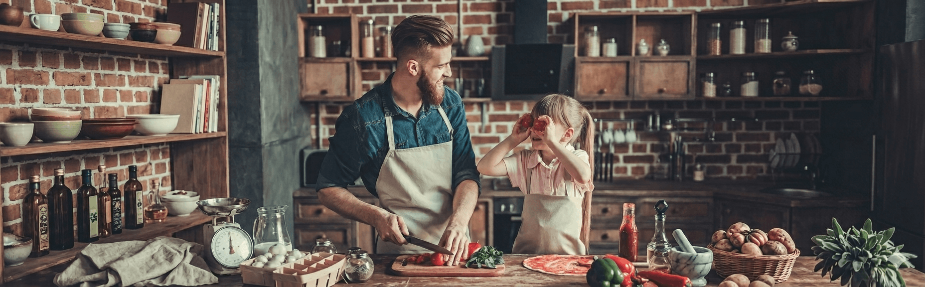 Man and girl preparing food in a rustic kitchen with shelves and various items.