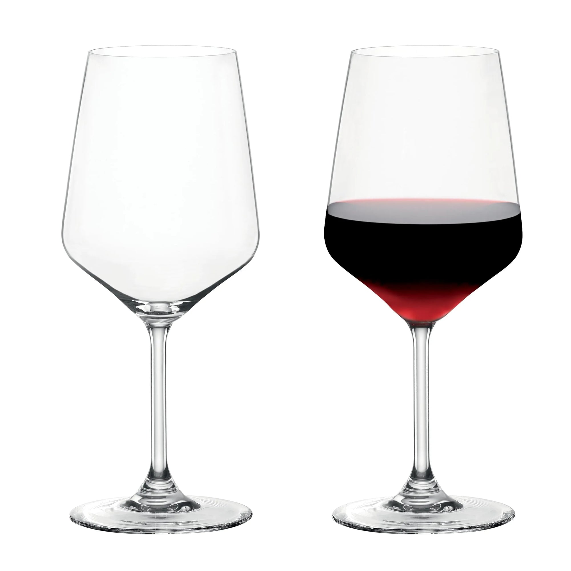 Two clear stemmed wine glasses on a white background, with the left glass empty and the right glass partially filled with red wine.