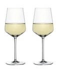 Two clear wine glasses filled with white wine, shown side by side on a plain white background.