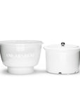 Two white kitchen containers with 'Ankarsrum' branding on a white background