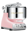 Cloudy pink kitchen stand mixer with silver bowl on a white background