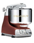 Ankarsrum stand mixer with a rustic maroon base and silver top on a white background