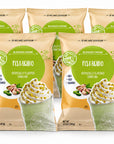 Five bags of Pistachio Blended Crème drink mix arranged in two rows against a white background. The front bags are fully visible, showing the beige packaging with a green circular logo and an illustration of a pistachio drink with whipped cream and pistachios.