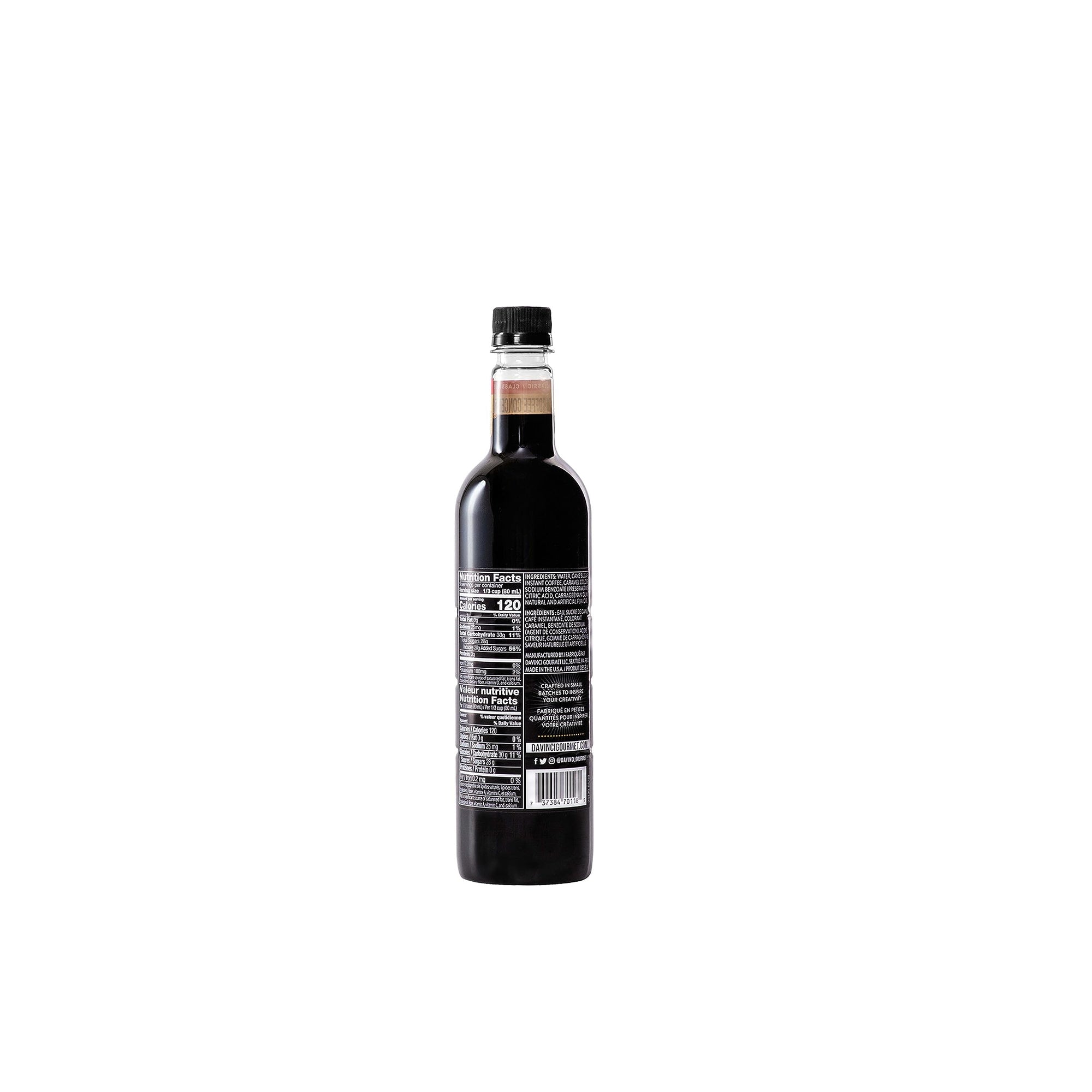 Bottle of dark liquid on a white background