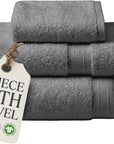A 3-piece set of folded dark gray cotton bath towels with a hanging tag that reads '3 PIECE BATH TOWEL' and a circular badge that says '100% ORGANIC COTTON'.