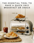 Toaster with croissants on a kitchen counter with text about quick breakfast or snack.