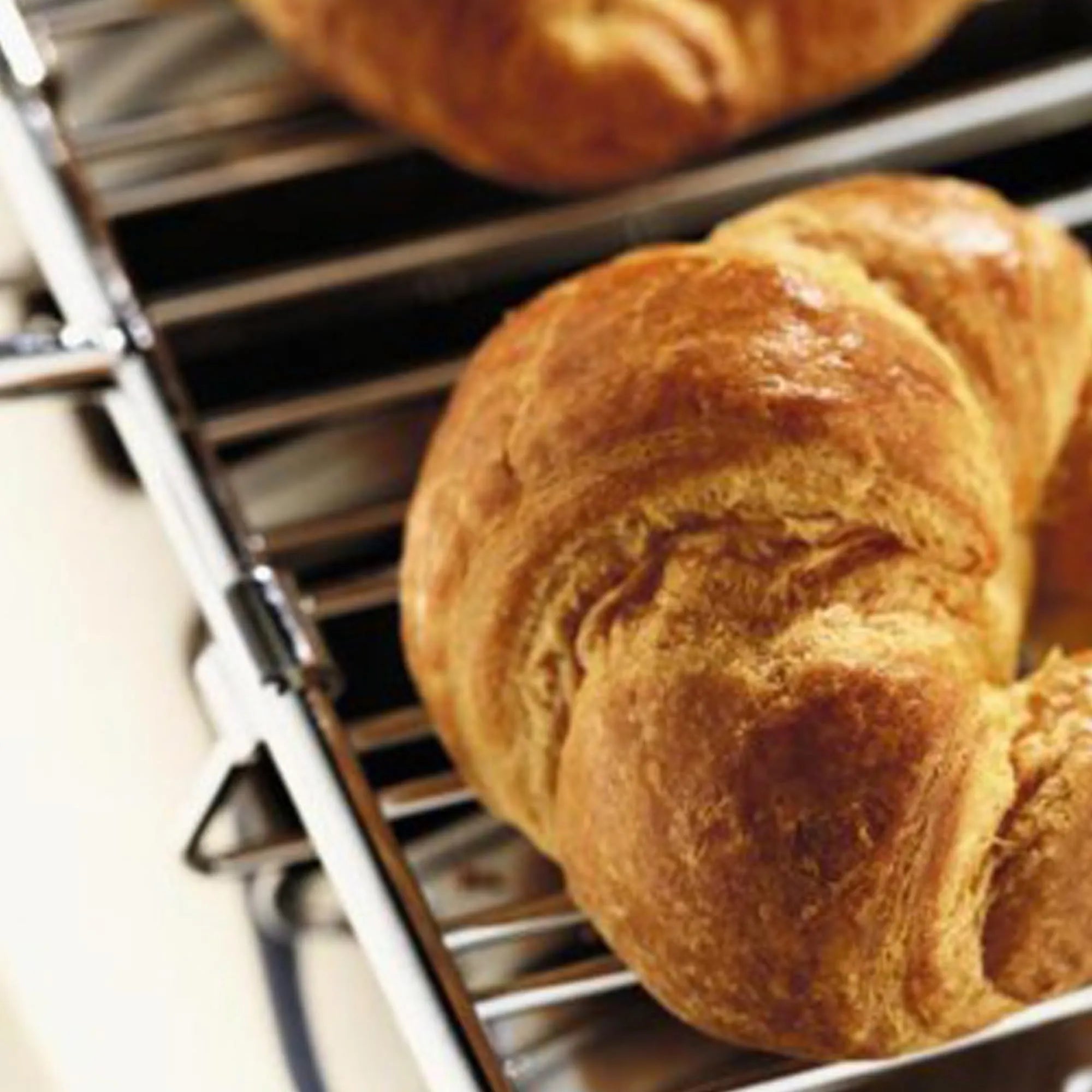 Loaves of bread on a warming rack