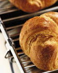 Loaves of bread on a warming rack