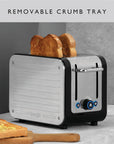 Toaster with removable crumb tray and bread on a gray background