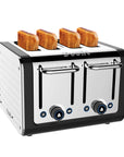 Toaster with four slices of toast on a white background