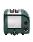 Green toaster with metal finish on a white background