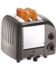 Dualit toaster with two slices of toast on a white background