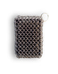 Metal chain link scrubber on a white background