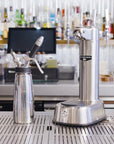 A stainless steel special coffee machine displayed on a coffee bar setting.