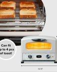 Toaster oven with toast on a rack and dimensions displayed