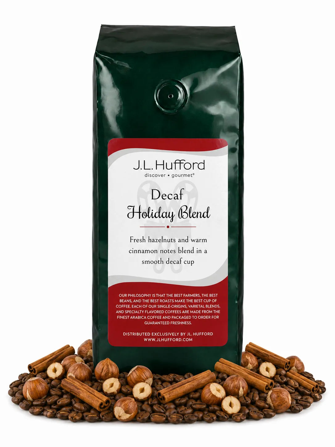 1 lb Decaf Holiday Blend coffee beans bag with coffee beans, hazelnuts, and cinnamon sticks in front displayed on a white background