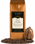 1 lb J.L. Hufford Decaf Mudslide coffee bag with coffee beans and mudslide drink on a white background