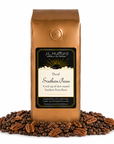 1 lb J.L. Hufford Decaf Southern Pecan coffee bag with coffee beans and pecans on a white background