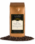 1 lb J.L. Hufford Decaf Trucker's Brew coffee bag with coffee beans on a white background