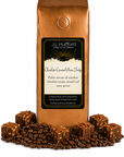 1 lb J.L. Hufford Chocolate Caramel Pecan Fudge Coffee with coffee beans and chocolate pecan fudge blocks drizzled with caramel in front displayed on a white background