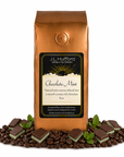 1 lb J.L. Hufford Chocolate Mint Coffee beans bag with coffee beans and chocolate mint blocks in front displayed on a white background