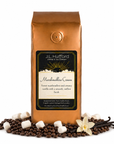 1 lb J.L. Hufford Marshmallow Cream coffee bag with coffee beans, marshmallows, and vanilla sticks on a white background