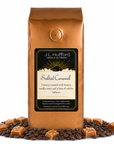 1 lb J.L. Hufford Salted Caramel coffee bag with coffee beans and blocks of salted caramel on a white background