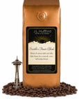 1 lb J.L. Hufford Seattle's Finest Blend coffee bag with coffee beans and space needle on a white background