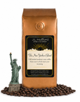 1 lb J.L. Hufford The New Yorker Blend coffee bag with coffee beans and statue of liberty on a white background
