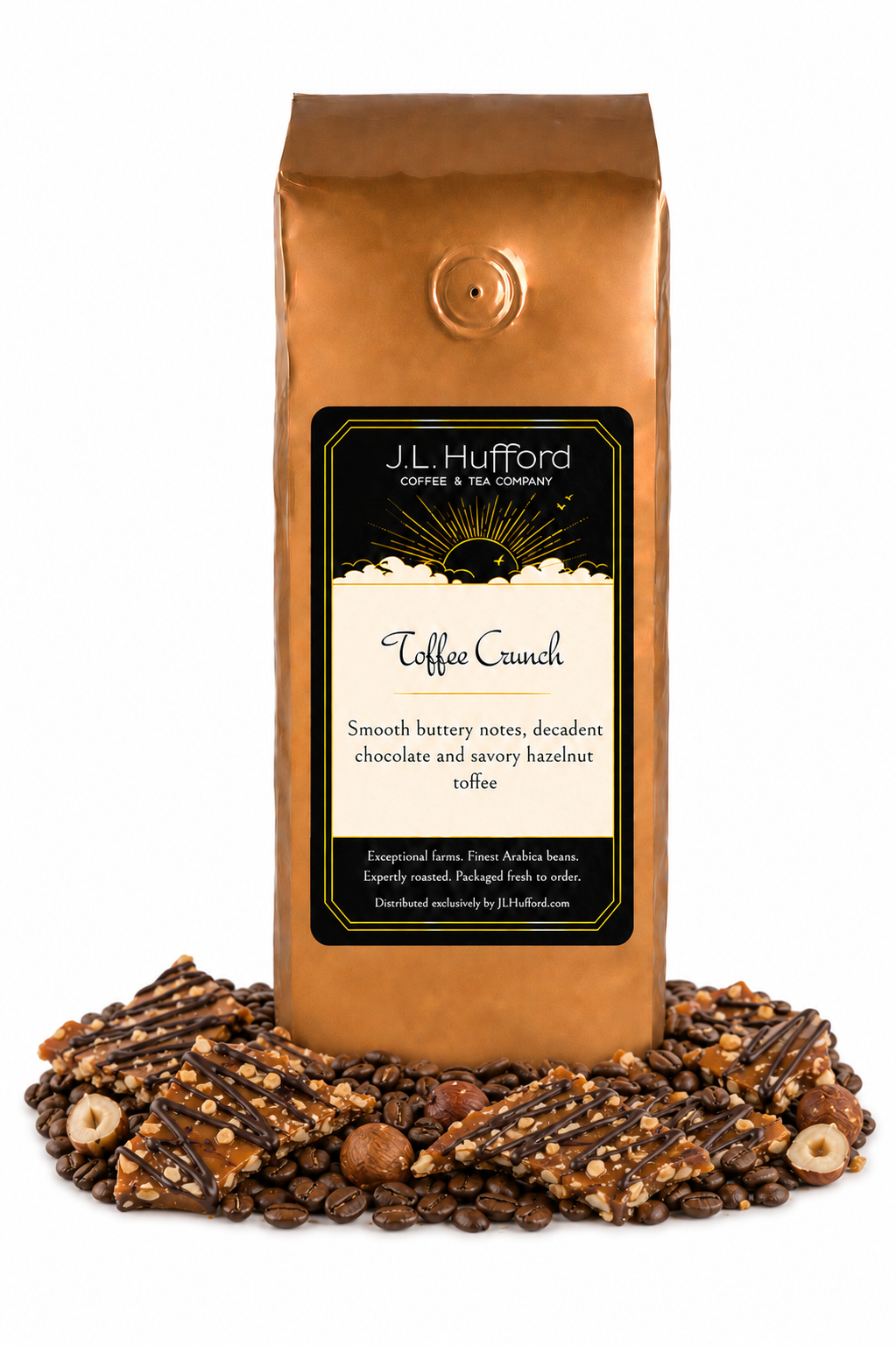 1 lb J.L. Hufford Toffee Crunch coffee bag with coffee beans, hazelnuts, and toffee bark with drizzled chocolate on a white background