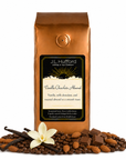 1 lb J.L. Hufford Vanilla Chocolate Almond coffee bag with coffee beans, vanilla sticks, almonds, milk chocolate on a white background