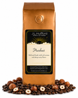 1 lb J.L. Hufford Hazelnut coffee bag with coffee beans and hazelnuts on a white background