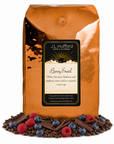 5 lb Berry Swirl coffee beans bag with coffee beans, blueberries, raspberries, and chocolate in front displayed on a white background