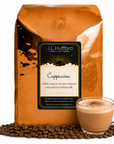 5 lb J.L. Hufford Cappuccino Coffee with coffee beans and a cappuccino in front displayed on a white background