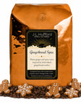 5 lb Gingerbread Spice coffee beans bag with coffee beans and gingerbread cookies in front displayed on a white background