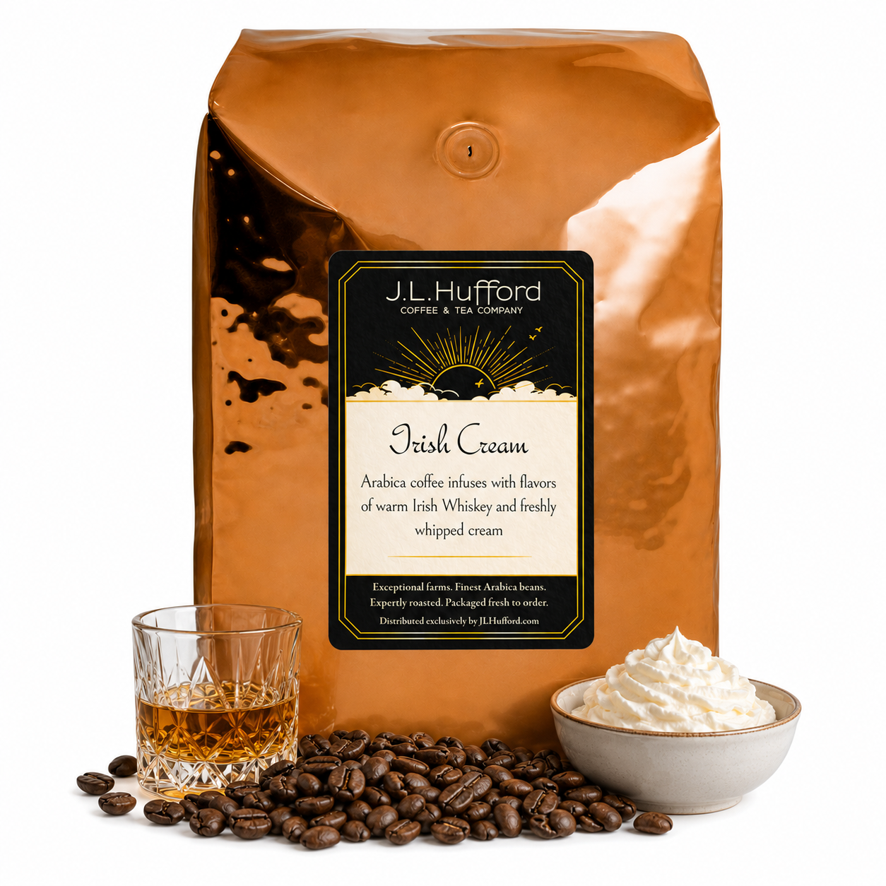 5 lb J.L. Hufford Irish Cream coffee bag with coffee beans, glass of Irish whiskey, and bowl of whipped cream on a white background