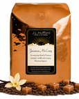 5 lb J.L. Hufford Jamaican Me Crazy coffee bag with coffee beans, blocks of caramel, and vanilla sticks on a white background